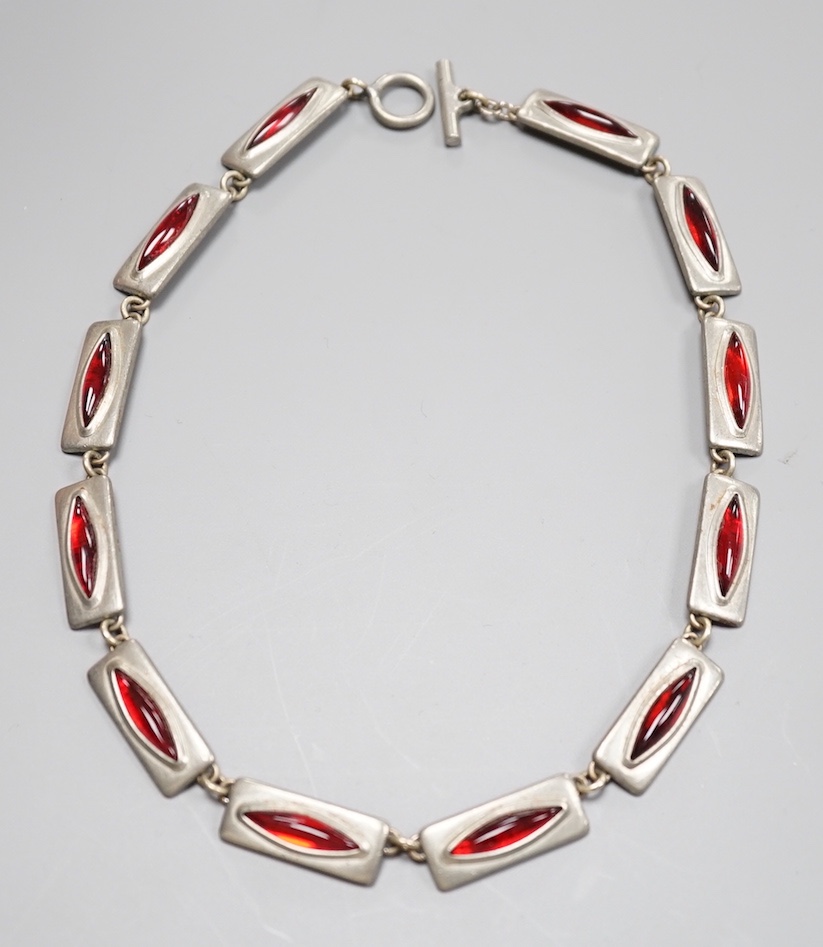 A stylish Jorgen Jensen pewter and red paste set necklace, 39cm.